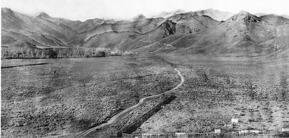 Historic view of Ketchum Cemetery with mountains in background
